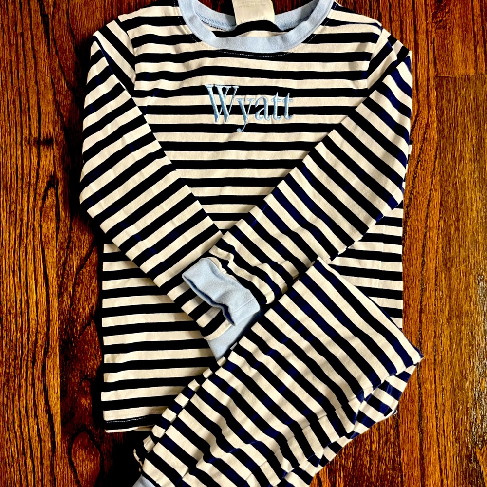 EUC pajama with “wyatt” embroidered on the front.  Size 6.  Worn once.